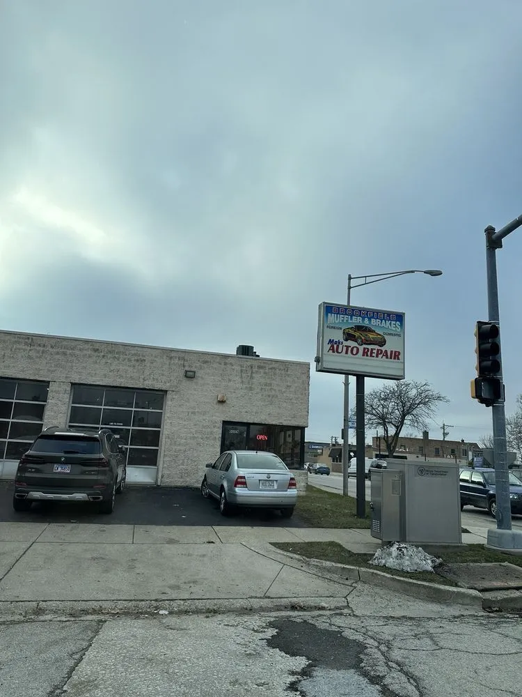 Brookfield Mufflers & Brakes storefront, pole sign, and service bays